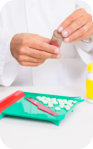 pharmacist holding medicines